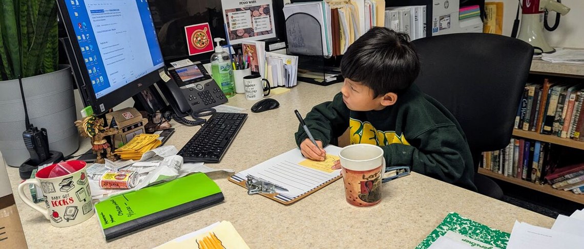 Principal of the Day, Dr. Truong starts his day making a to-do-list