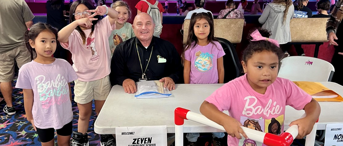 Students checking in with Dr. Gerstner for Family Skate Night