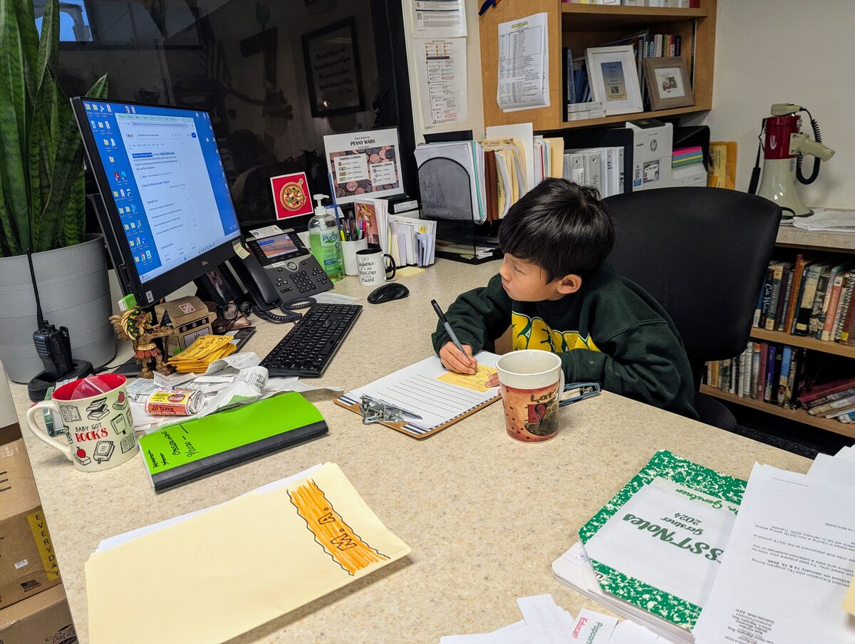 Principal of the Day, Dr. Truong starts his day making a to-do-list