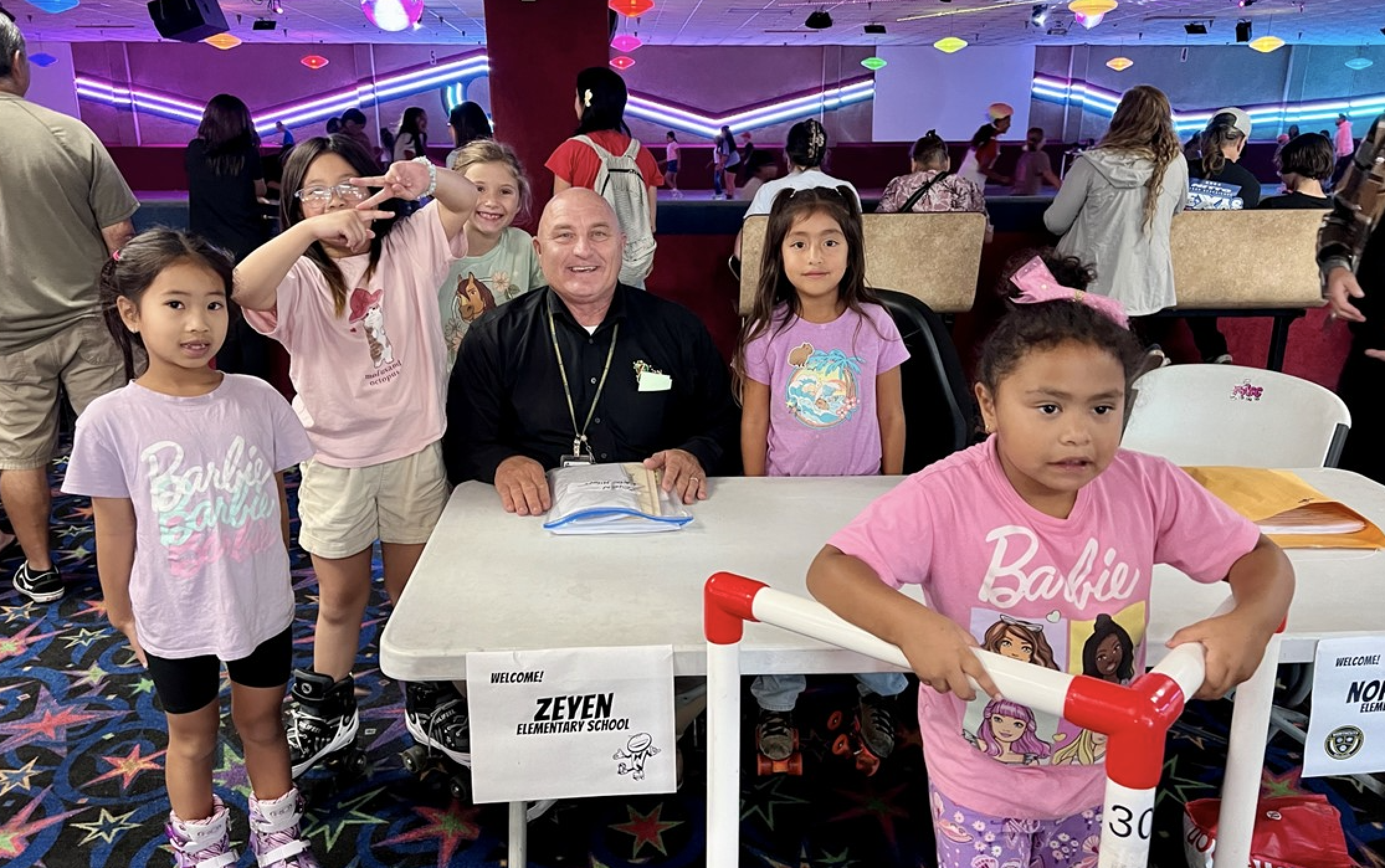 Students checking in with Dr. Gerstner for Family Skate Night