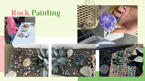 Students drawing art on rocks