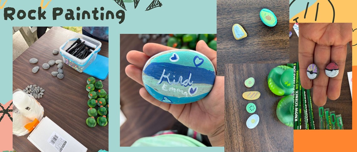 Students showing their painted rocks