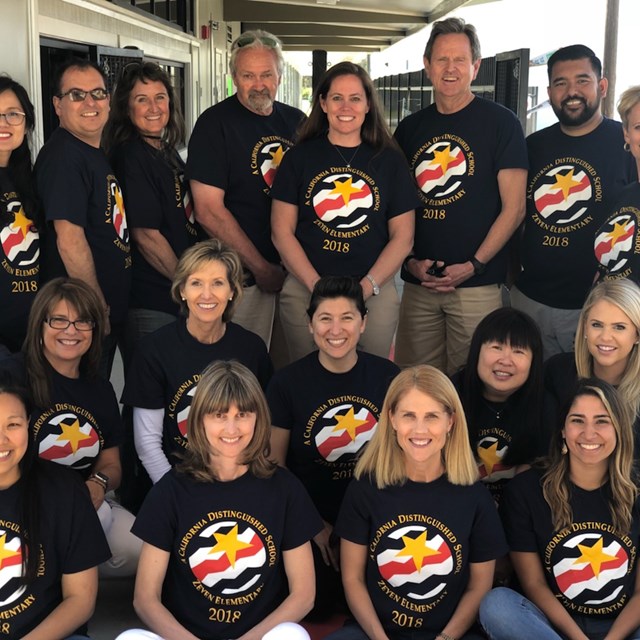 Our hardworking staff celebrates Zeyen's award-winning status in their brand new attire!